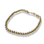 Bracciale con sfere bicolore , in oro 18kt